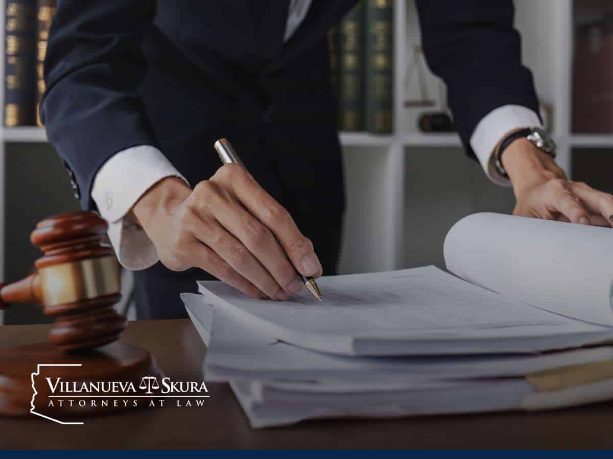 Lawyer reviewing documents, illustrating escalation of commitment